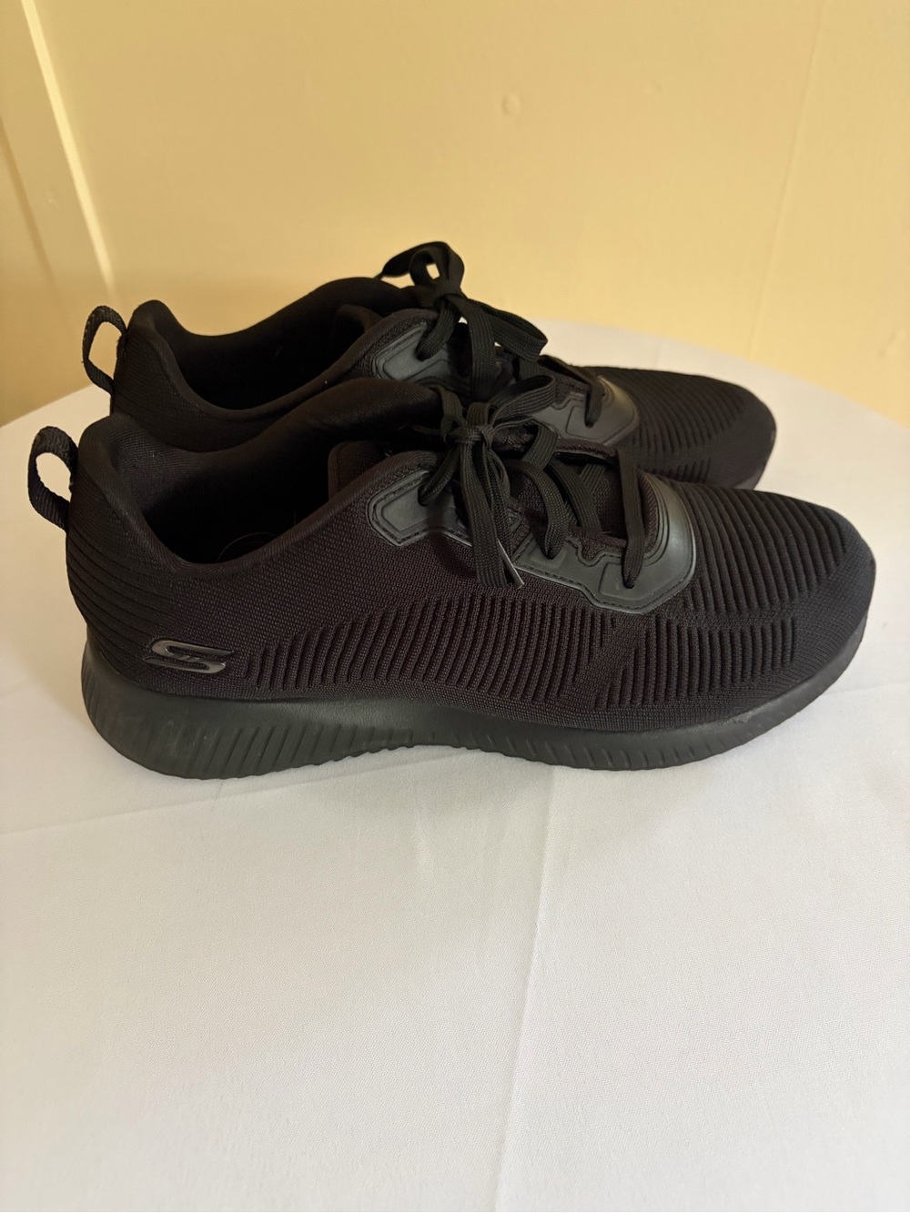 Skechers All-Black Knit Lace-Up Sneakers